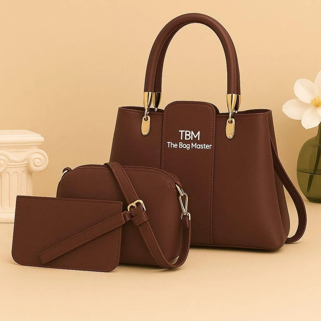 Brown handbag with matching wallet and small pouch on a white background