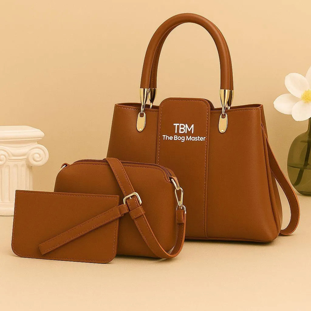 Brown handbag with matching pouch on a beige background, featuring 'TBM The Bag Master' branding.