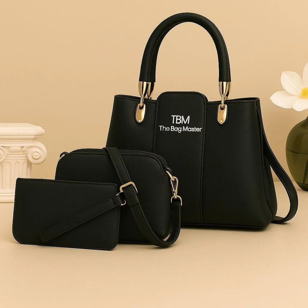 Black handbag set with matching pouch on a beige background