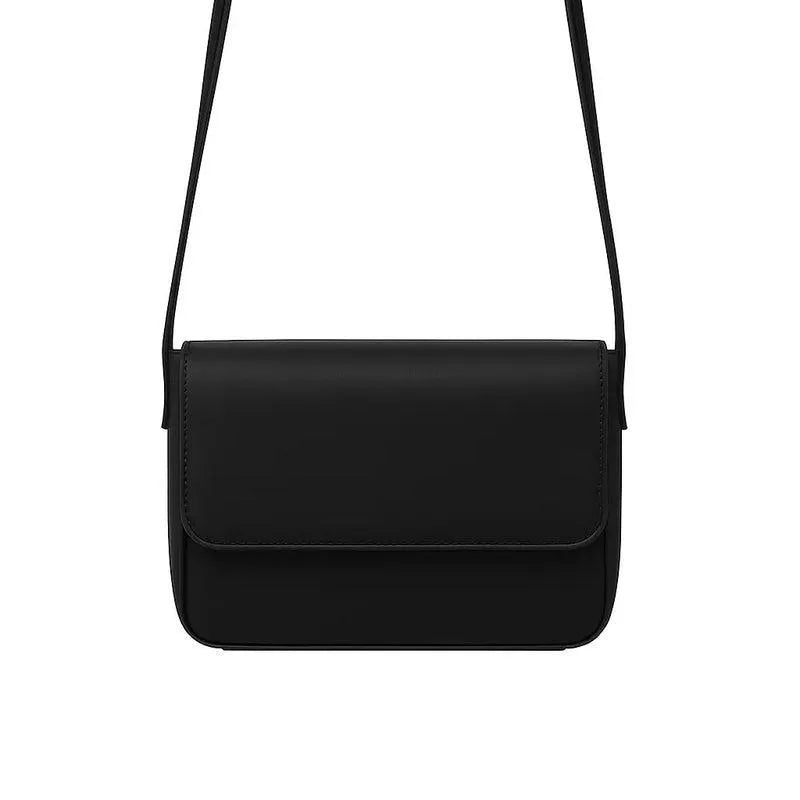 Black leather crossbody bag on a white background